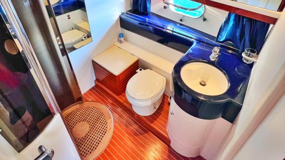 The bathroom of the motor yacht Hadron stands out with its modern equipment and stylish design.